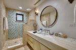 Jr. Master en-suite bathroom with shower, bath amenities provided